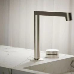 Rocker bathroom sink faucet handle