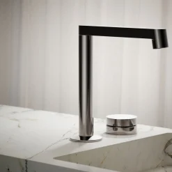 Rocker bathroom sink faucet handle