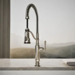 Semi-professional kitchen sink faucet with three-function sprayhead