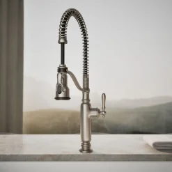 Semi-professional kitchen sink faucet with three-function sprayhead
