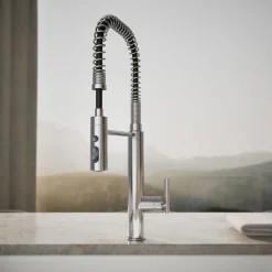 Semi-professional kitchen sink faucet with three-function sprayhead