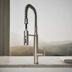 Semi-professional kitchen sink faucet with three-function sprayhead
