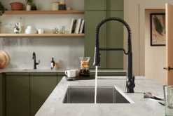 Semi-professional pull-down kitchen sink faucet with three-function sprayhead
