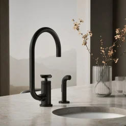 Single-handle bar sink faucet with two-function extended-reach spout and side sprayer