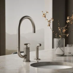 Single-handle bar sink faucet with two-function extended-reach spout and side sprayer