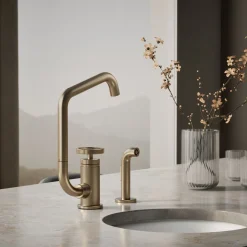 Single-handle bar sink faucet with two-function extended-reach spout and side sprayer