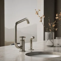 Single-handle bar sink faucet with two-function extended-reach spout and side sprayer