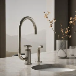 Single-handle bar sink faucet with two-function extended-reach spout and side sprayer