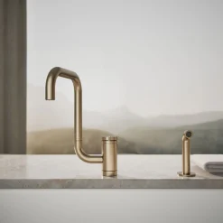 Single-handle kitchen sink faucet with two-function extended-reach spout and side sprayer