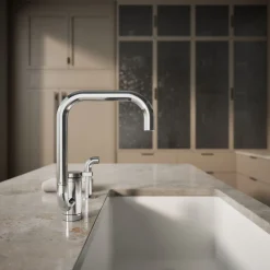 Single-handle kitchen sink faucet with two-function extended-reach spout and side sprayer