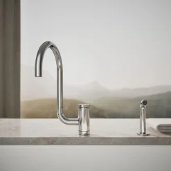 Single-handle kitchen sink faucet with two-function extended-reach spout and side sprayer
