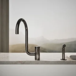 Single-handle kitchen sink faucet with two-function extended-reach spout and side sprayer