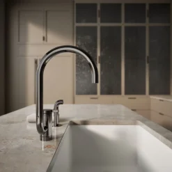 Single-handle kitchen sink faucet with two-function extended-reach spout and side sprayer