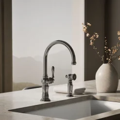 Single-handle kitchen sink faucet with two-function sprayhead