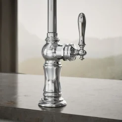 Single-handle kitchen sink faucet with two-function sprayhead
