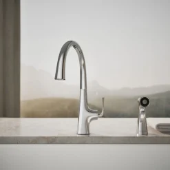 Single-handle kitchen sink faucet with two-function side sprayer
