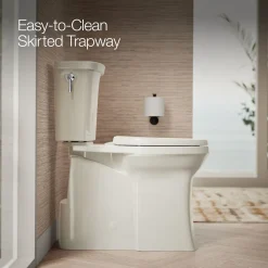 Tall ContinuousClean two-piece elongated toilet with skirted trapway, 1.28 gpf