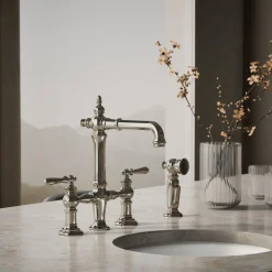 Three-hole bridge bar sink faucet with side sprayer