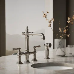 Three-hole bridge bar sink faucet with side sprayer