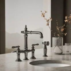 Three-hole bridge bar sink faucet with side sprayer
