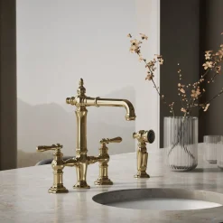 Three-hole bridge bar sink faucet with side sprayer