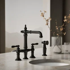 Three-hole bridge bar sink faucet with side sprayer