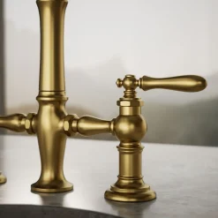 Three-hole bridge bar sink faucet with side sprayer
