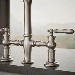 Three-hole bridge kitchen sink faucet with side sprayer