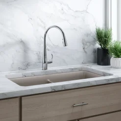 Touchless pull-down kitchen sink faucet with three-function sprayhead