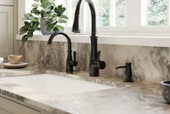 Touchless pull-down kitchen sink faucet with three-function sprayhead