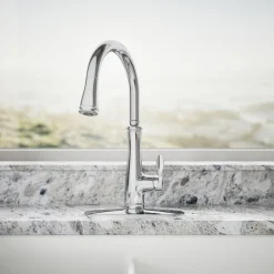 Touchless pull-down kitchen sink faucet with three-function sprayhead