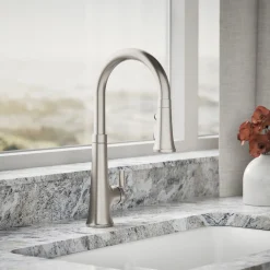 Touchless pull-down kitchen sink faucet with three-function sprayhead