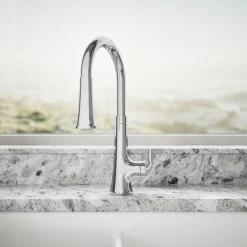 Touchless pull-down kitchen sink faucet with three-function sprayhead