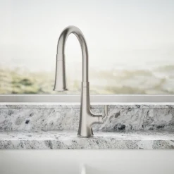 Touchless pull-down kitchen sink faucet with three-function sprayhead