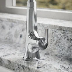 Touchless pull-down kitchen sink faucet with three-function sprayhead