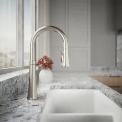 Touchless pull-down kitchen sink faucet with three-function sprayhead
