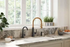 Touchless pull-down kitchen sink faucet with three-function sprayhead