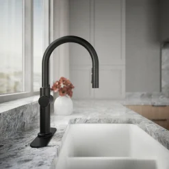 Touchless pull-down kitchen sink faucet with three-function sprayhead