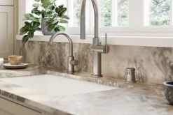 Touchless pull-down kitchen sink faucet with three-function sprayhead