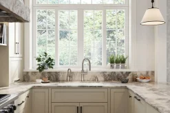 Touchless pull-down kitchen sink faucet with three-function sprayhead