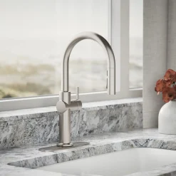 Touchless pull-down kitchen sink faucet with three-function sprayhead