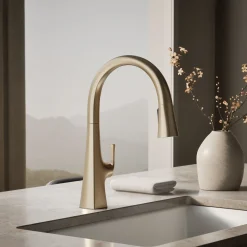 Touchless pull-down kitchen sink faucet with three-function sprayhead
