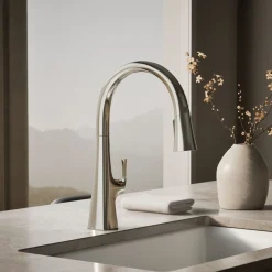 Touchless pull-down kitchen sink faucet with three-function sprayhead
