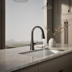 Touchless pull-down kitchen sink faucet with three-function sprayhead