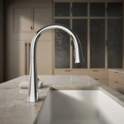 Touchless pull-down kitchen sink faucet with three-function sprayhead