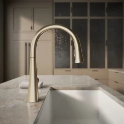 Touchless pull-down kitchen sink faucet with three-function sprayhead
