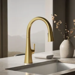 Touchless pull-down kitchen sink faucet with three-function sprayhead