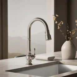 Touchless pull-down kitchen sink faucet with three-function sprayhead