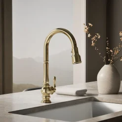 Touchless pull-down kitchen sink faucet with three-function sprayhead