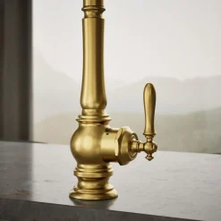 Touchless pull-down kitchen sink faucet with three-function sprayhead